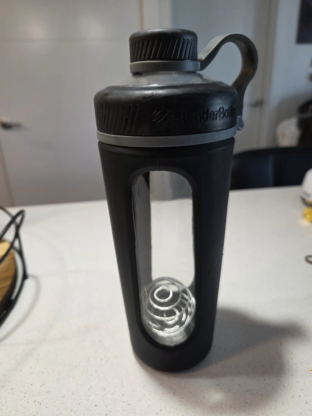 Glass protein shaker bottle with silicone sleeve, 20-28oz capacity