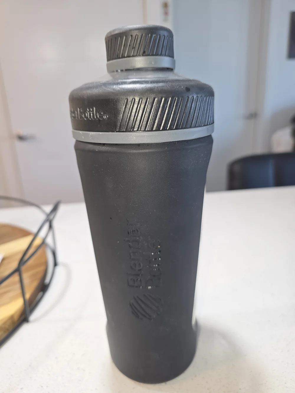 Glass protein shaker bottle with silicone sleeve, 20-28oz capacity