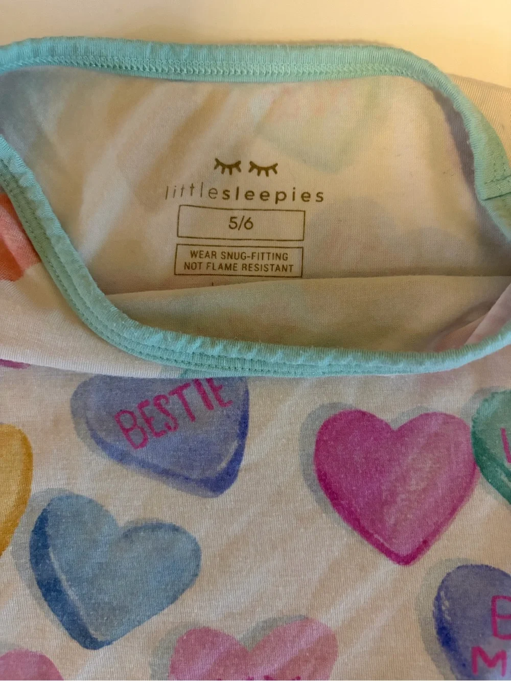 Little Sleepies pajama visible pastel
