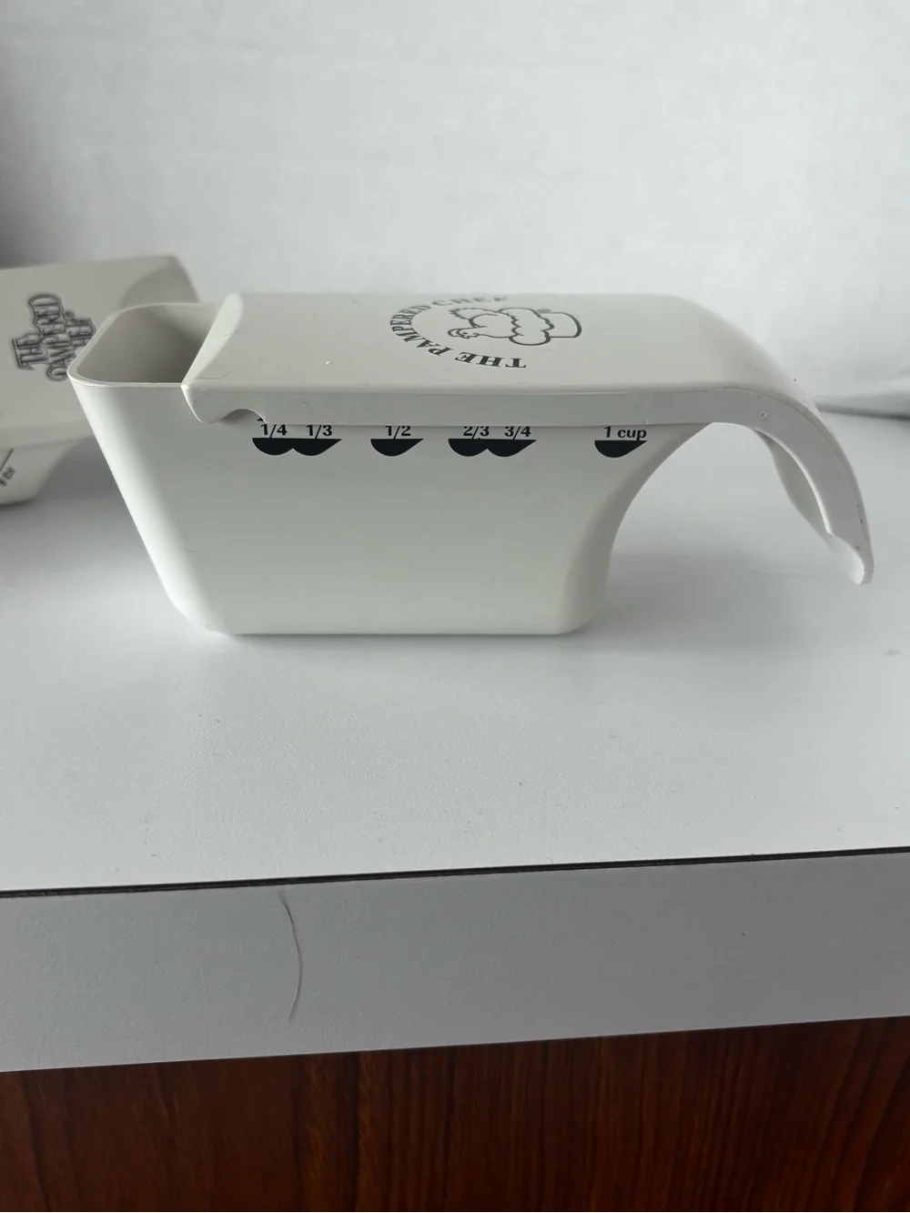 Two Vintage Pampered Chef adjustable measuring cups