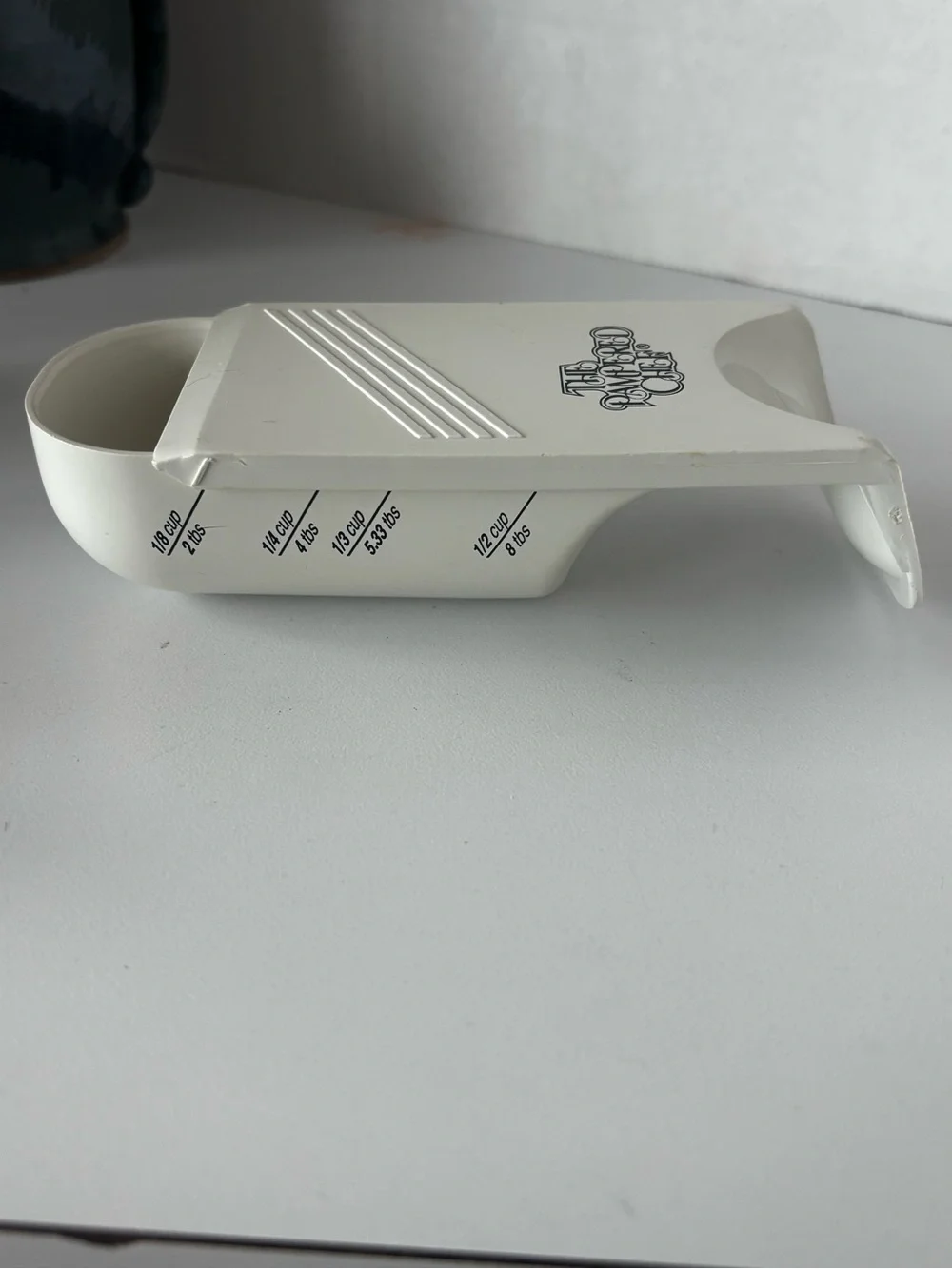 Two Vintage Pampered Chef adjustable measuring cups