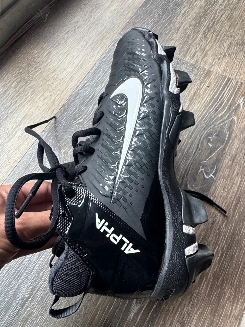 Nike Alpha Cleats below leave