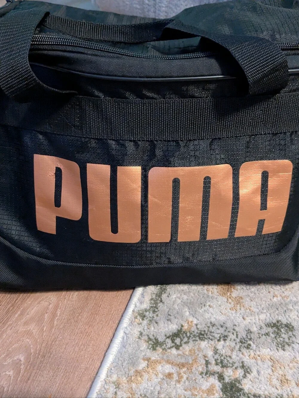 Puma Black Duffel Bag with Metallic Copper Logo