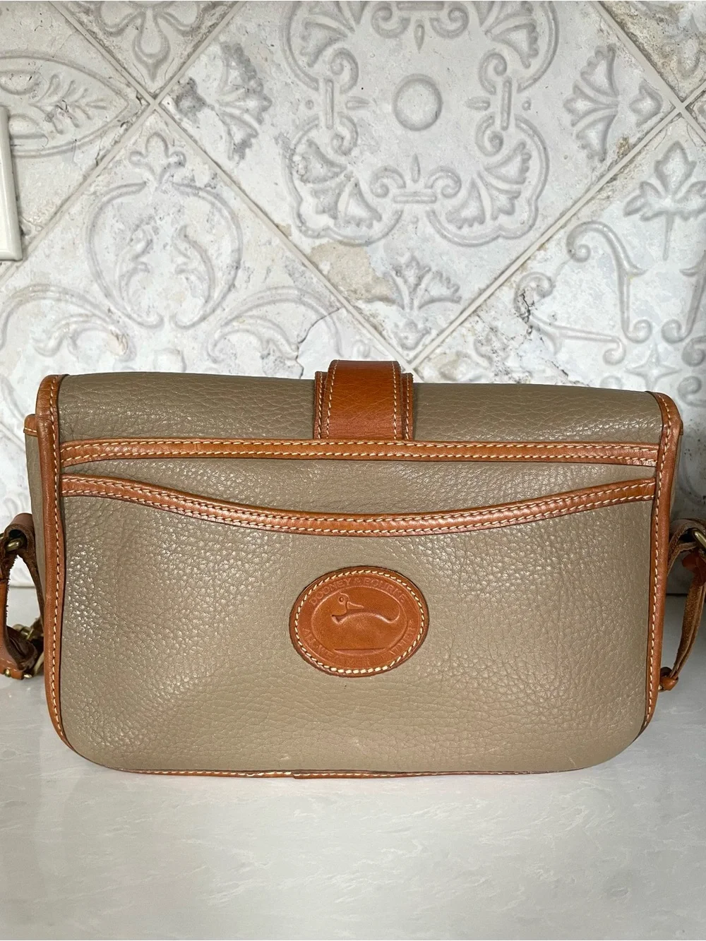 Dooney & Bourke notches body solid