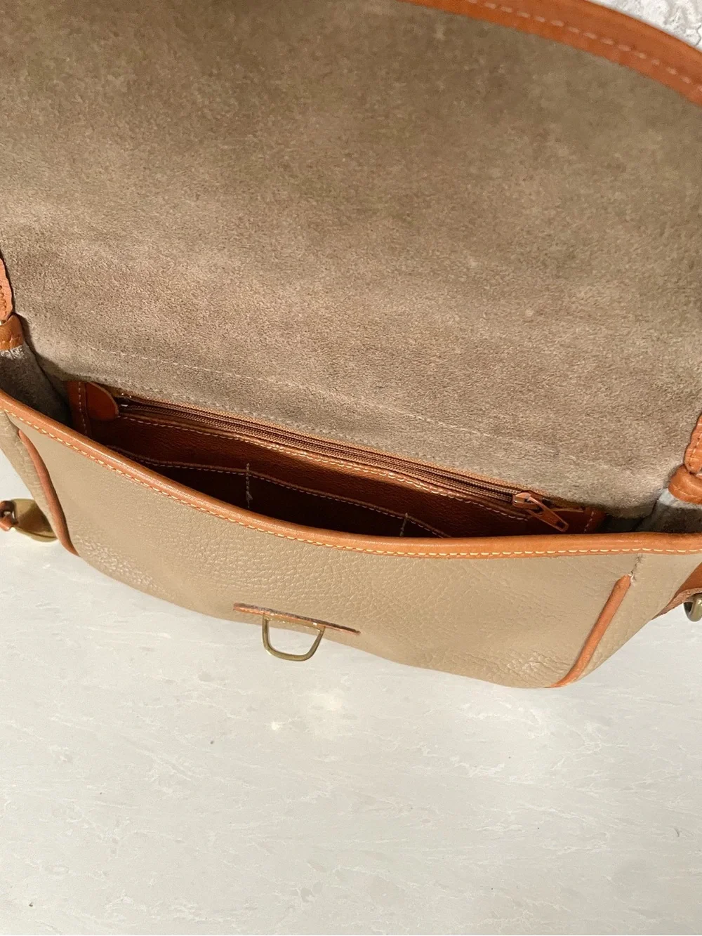 Dooney & Bourke zip notches