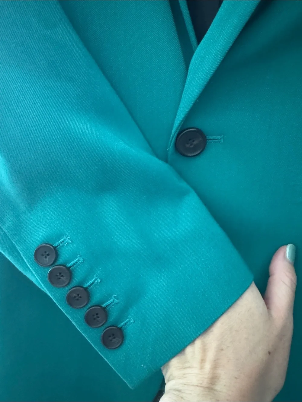 A.L.C. single button