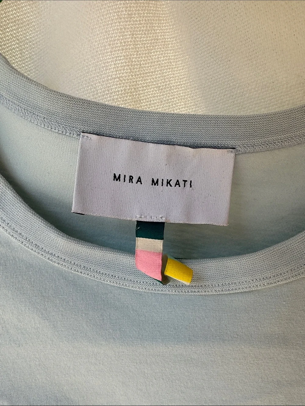 Mira Mikati Light Blue Tee with Teal, Orange & Pink Shoulder Stripes