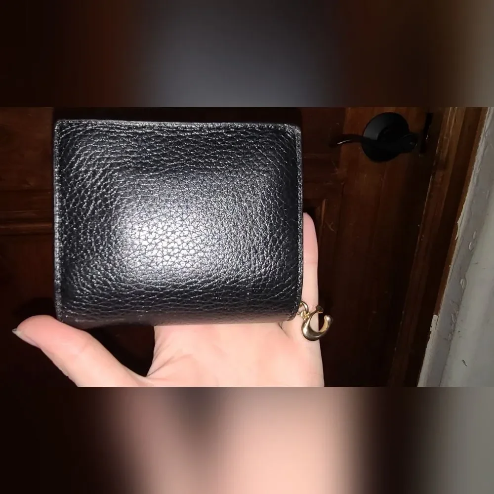 Coach sleek black