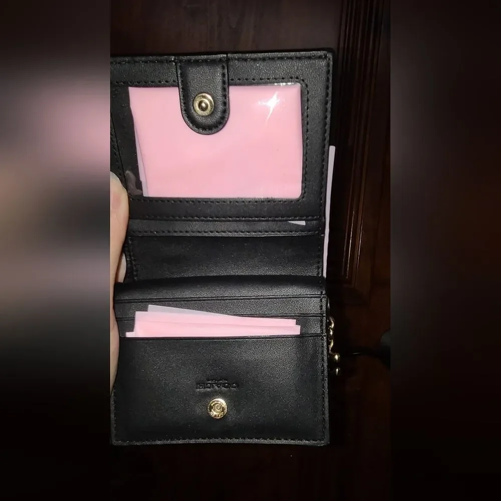 Coach sleek black