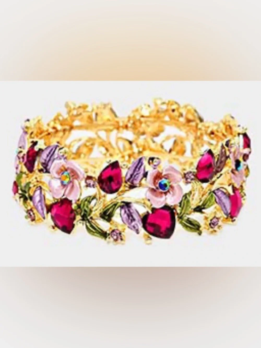 Gold Tone Women’s Floral Bracelet with Blue Crystal Accents