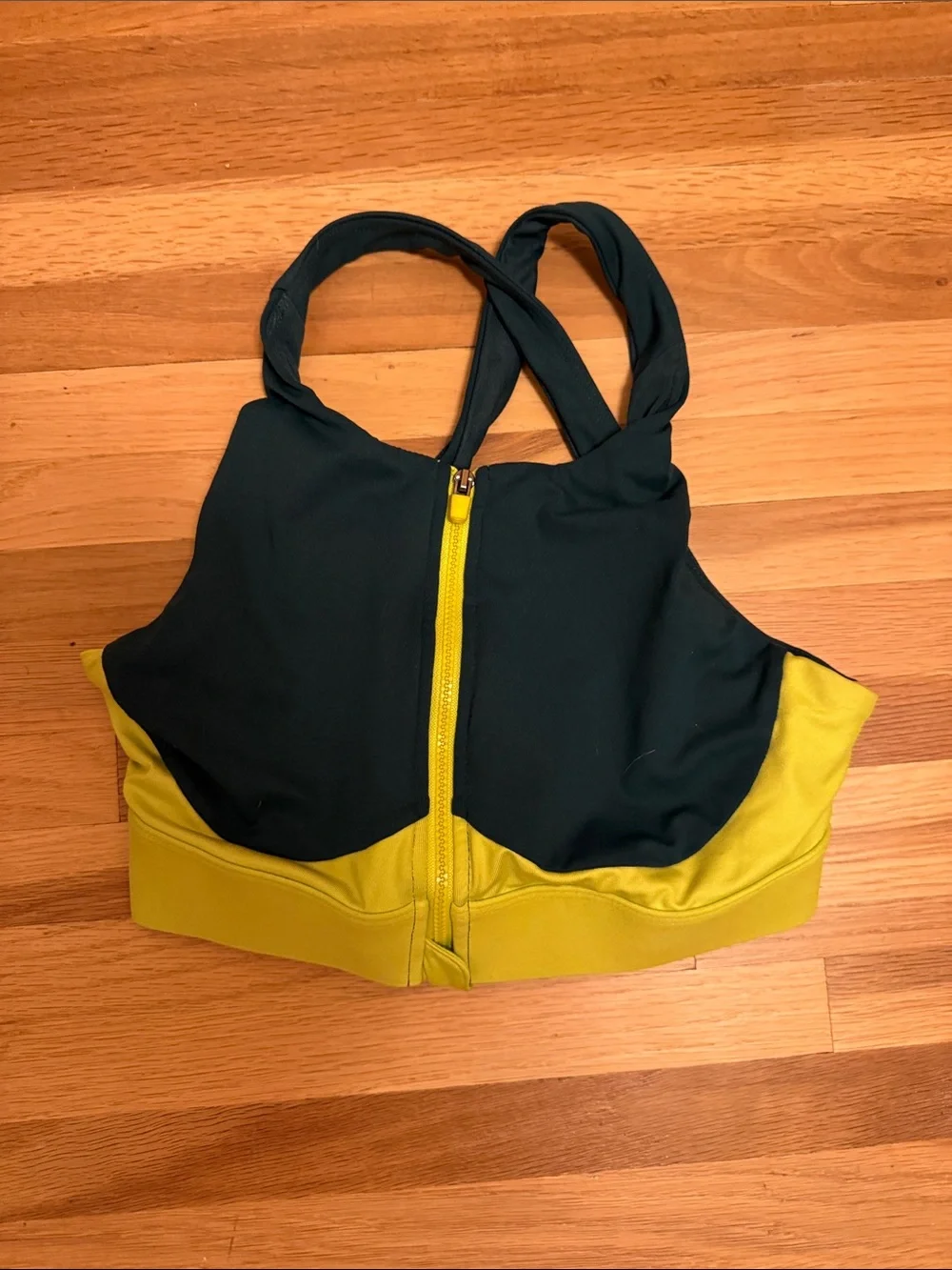 Fabletics Two-Tone Front-Zip Sports Bra in Black and Mustard
