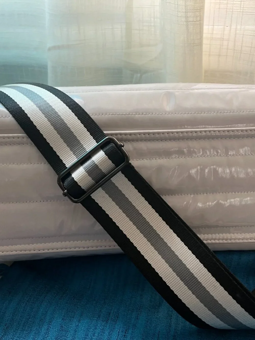 THINK ROYLN •	magnetic crossbody or