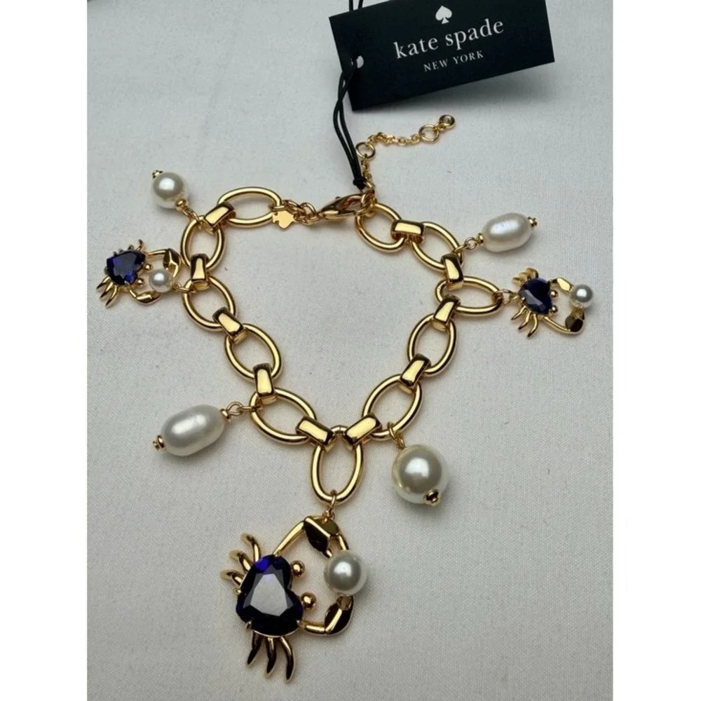 Kate‎ Spade claw out Gold Chain Bracelet with Blue Crystal & Pearl Charm