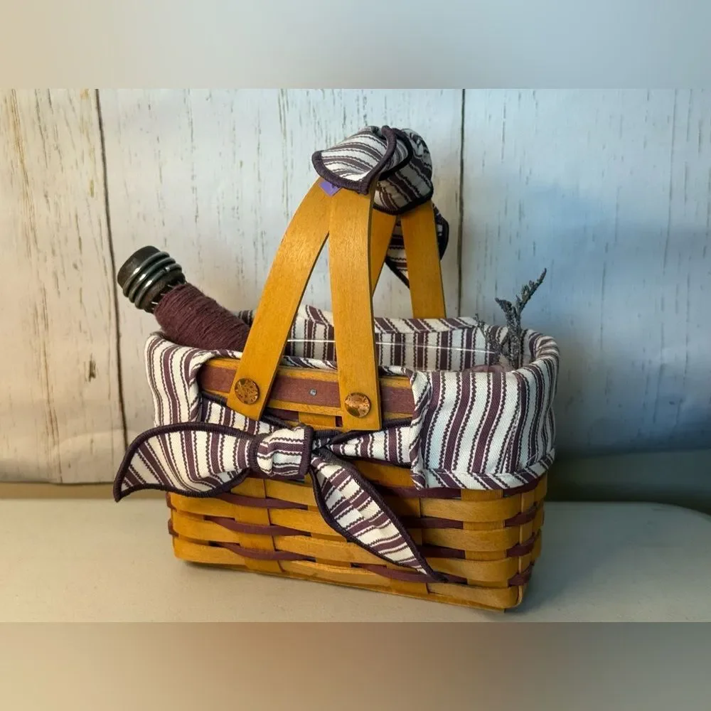 1998 Longaberger Basket with Plaid Liner Charm Ties Sweetheart Basket contents