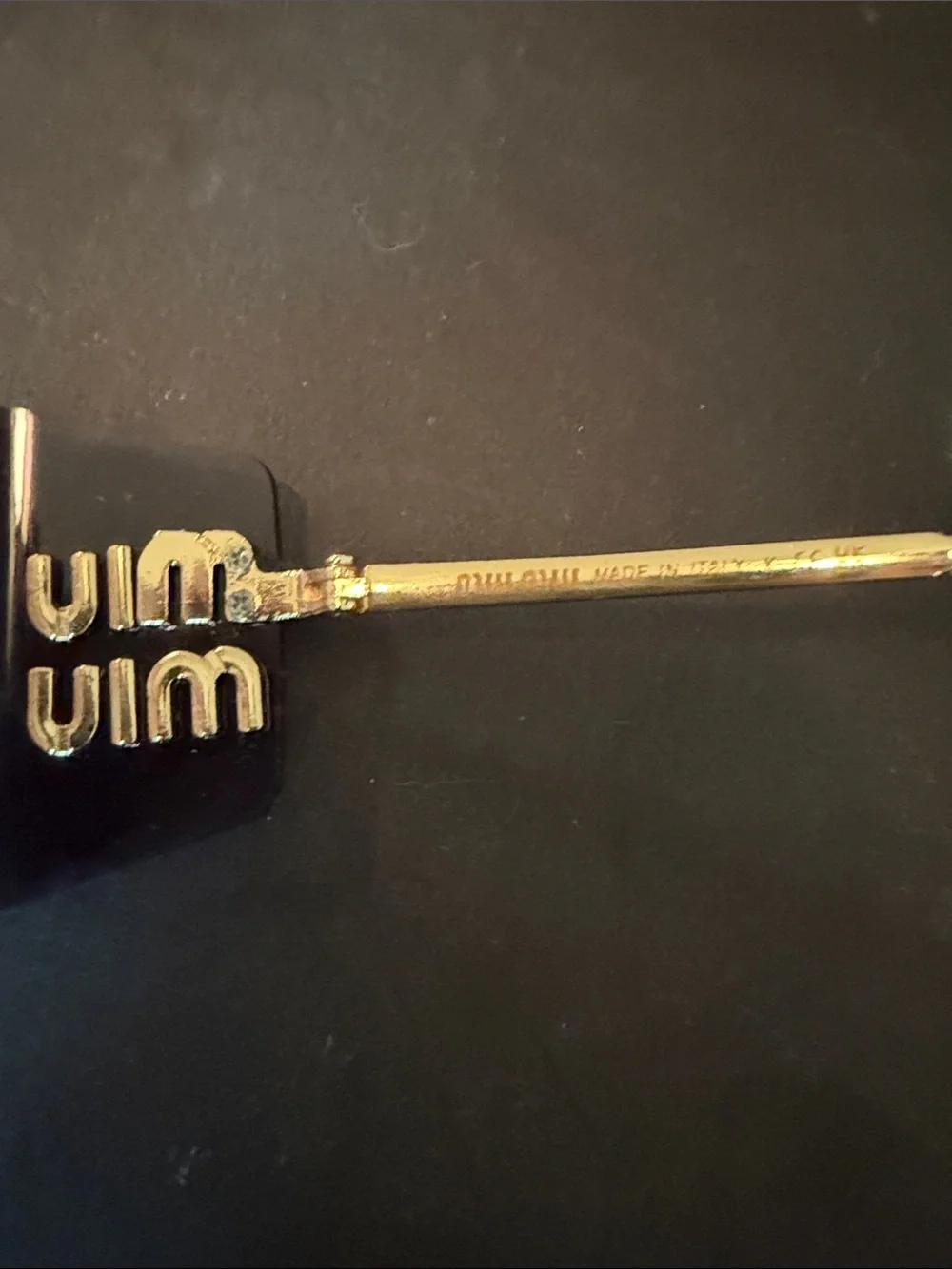 Miu Miu Rimless Sunglasses with Purple Gradient Lenses and Gold Accents