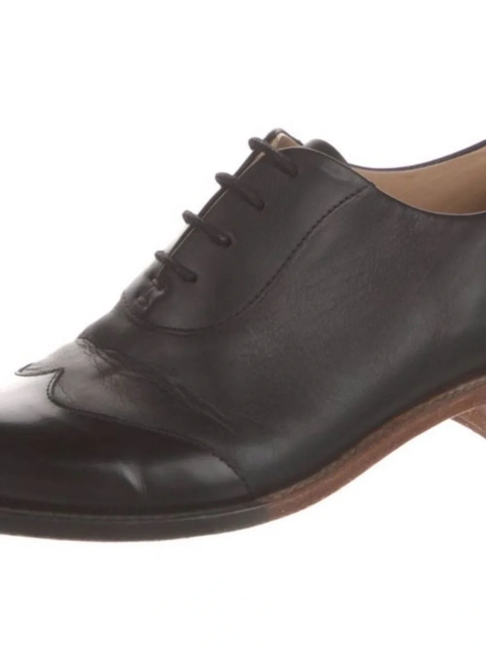 The Office Of Angela Scott polished black