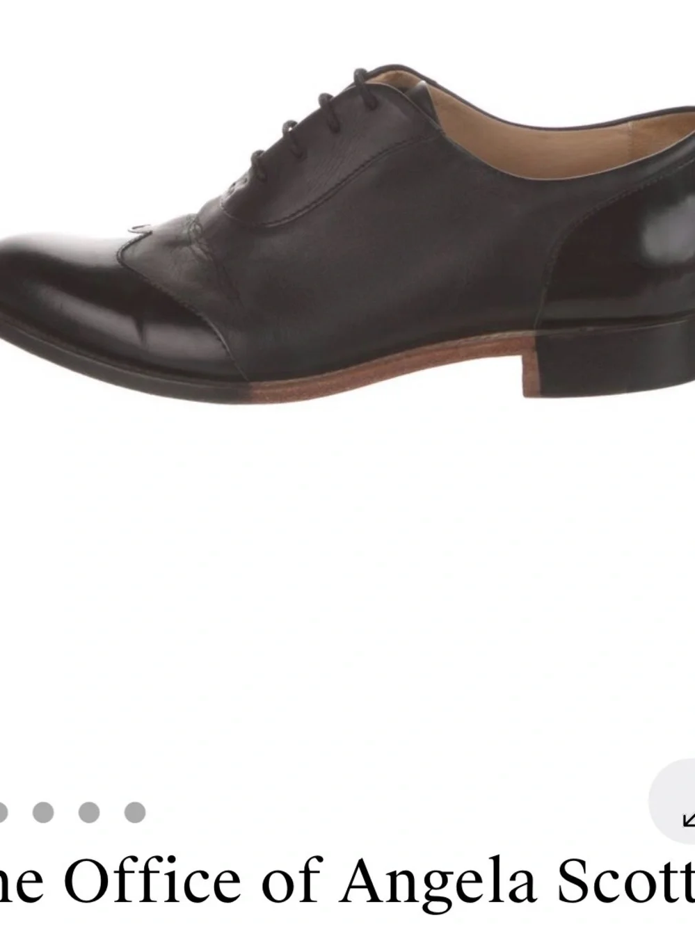 The Office Of Angela Scott polished black
