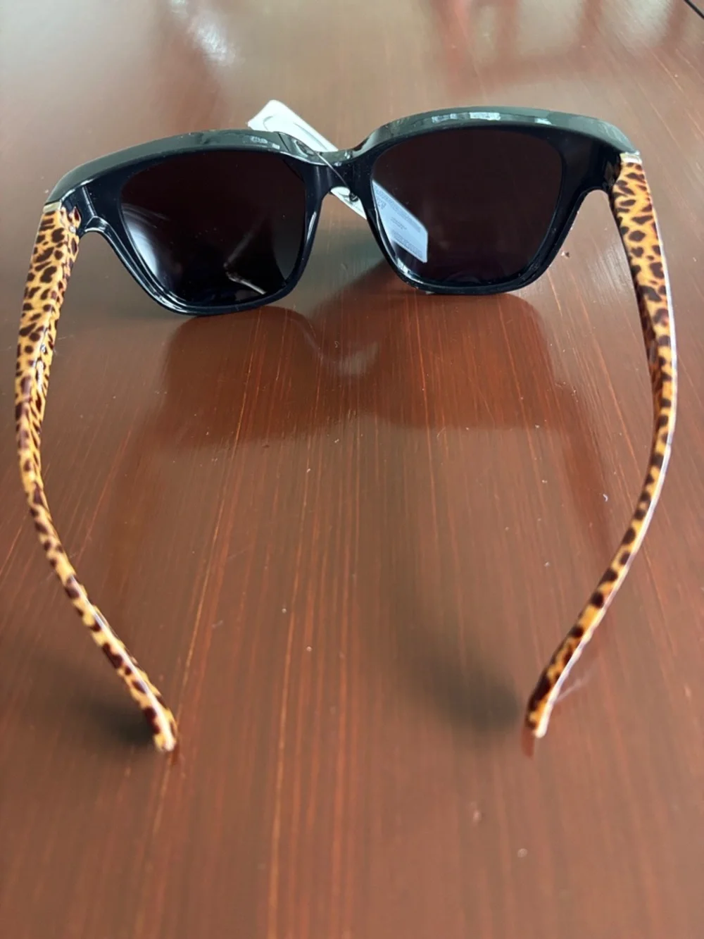 Foster Grant Solar Shield polarized,tortoise shell leopard arms,black frame/lens