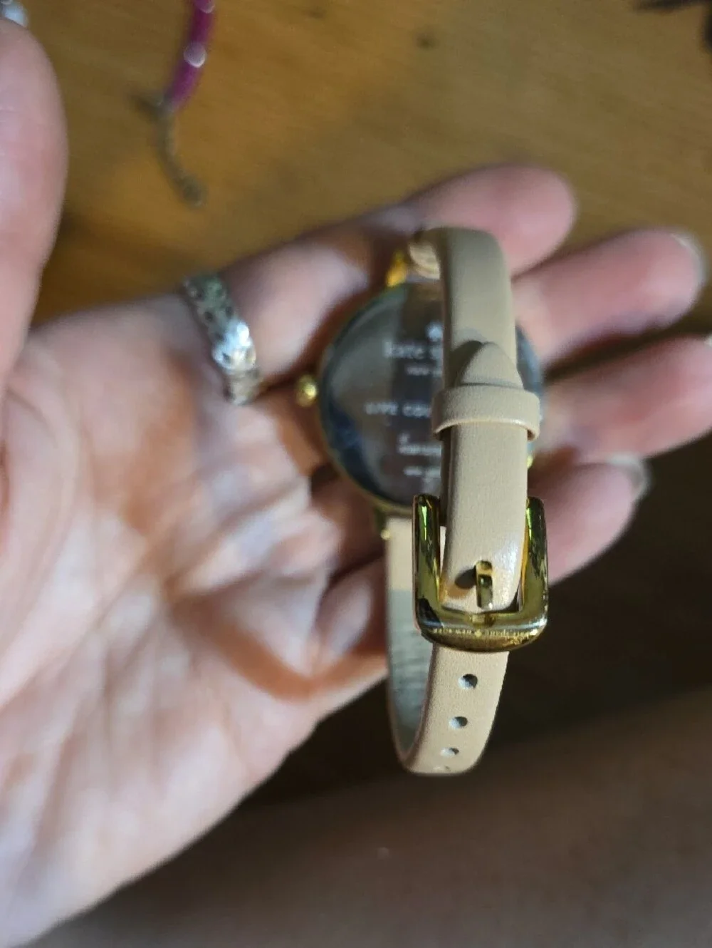 kate spade Black Floral Dial Watch with Cream Strap and Gold Case