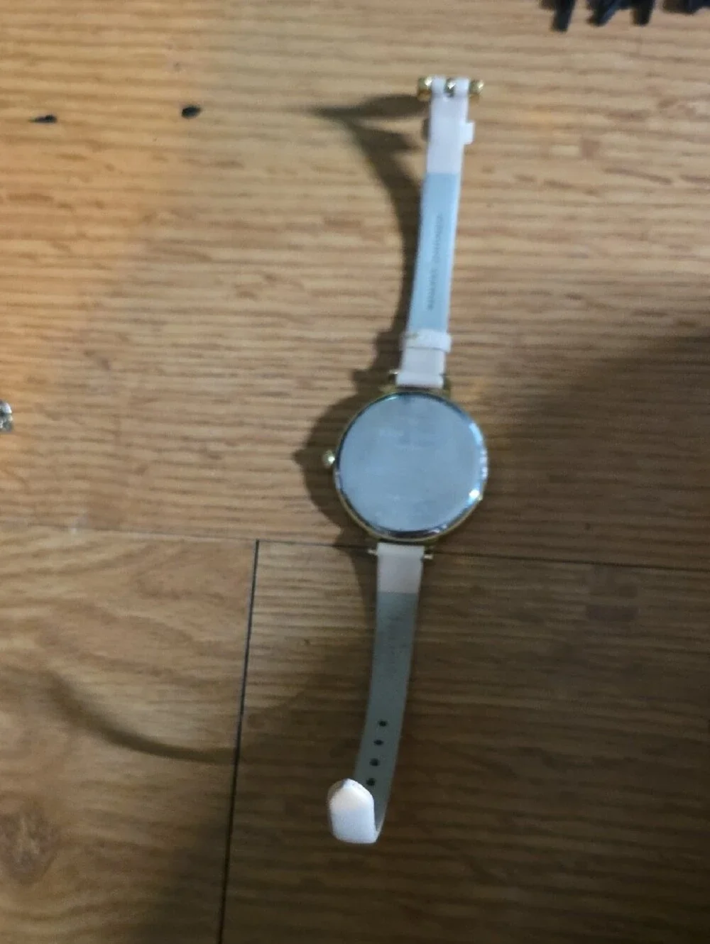 kate spade Black Floral Dial Watch with Cream Strap and Gold Case