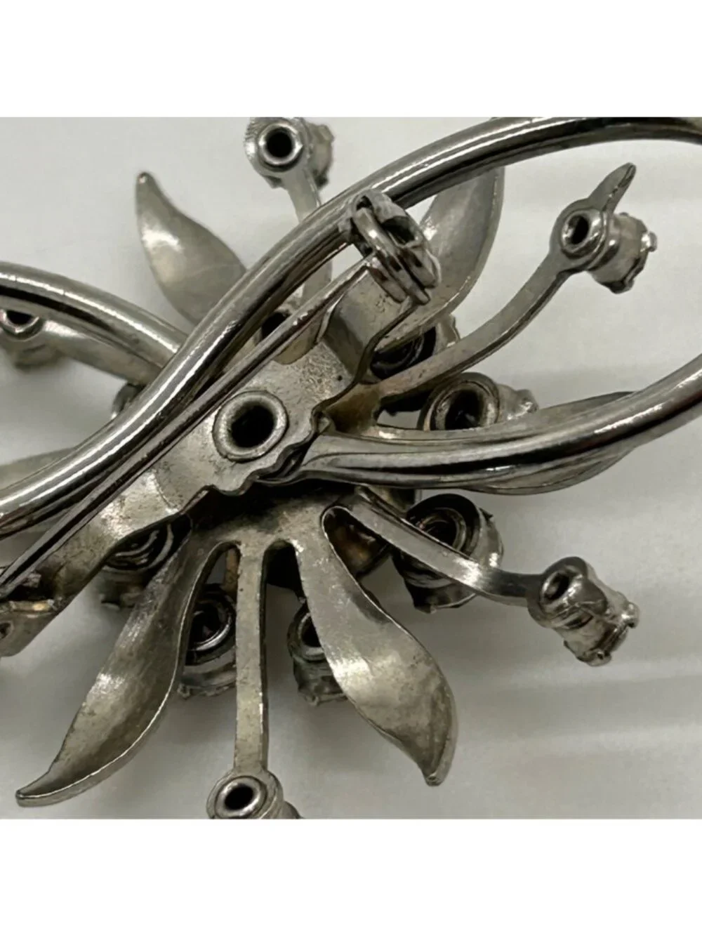 Vintage Clear Rhinestone Brooch Infinity Starburst Floral Pin Silver-tone MCM