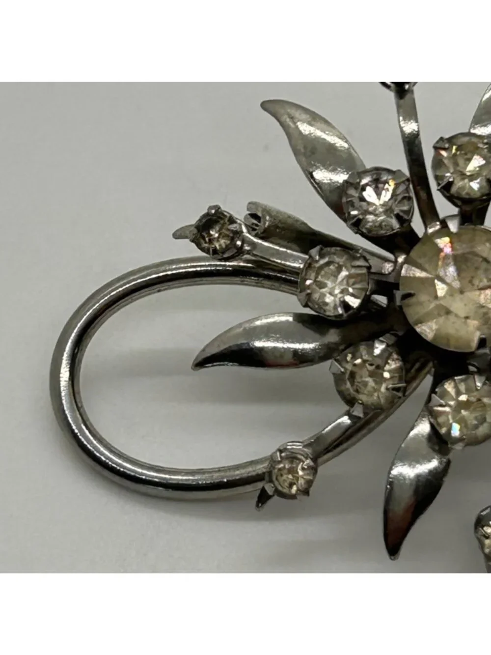 Vintage Clear Rhinestone Brooch Infinity Starburst Floral Pin Silver-tone MCM