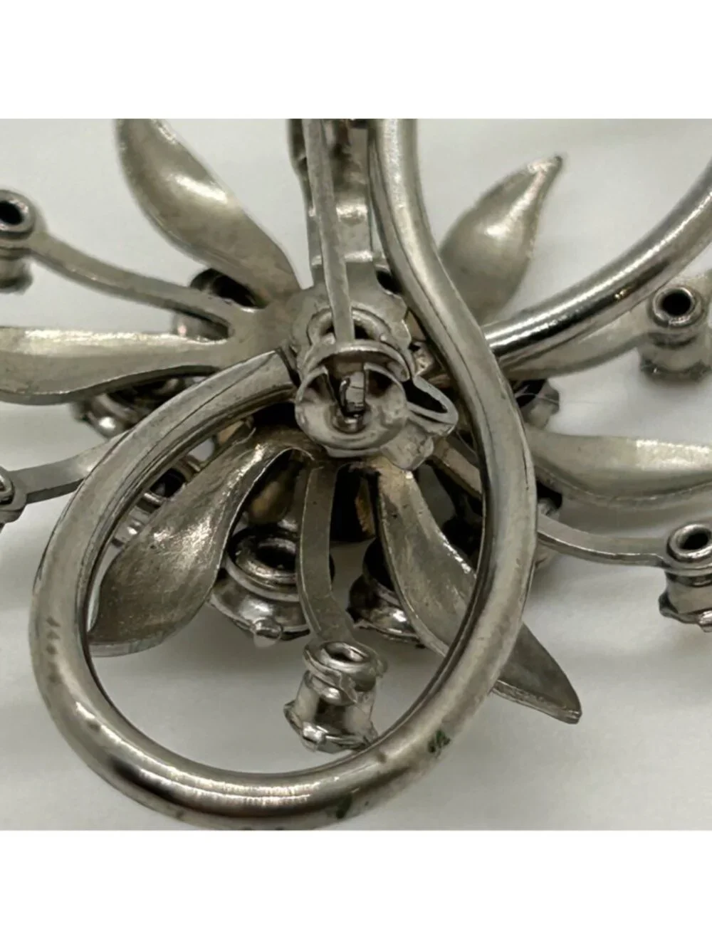 Vintage Clear Rhinestone Brooch Infinity Starburst Floral Pin Silver-tone MCM