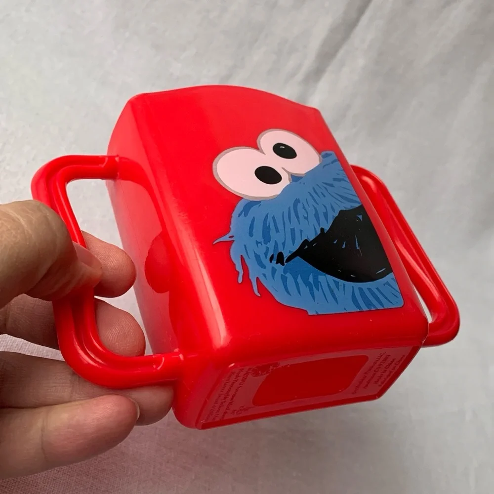 2013 Sesame Street Cookie Monster Kids Red Plastic Juice Box Holder with Handles