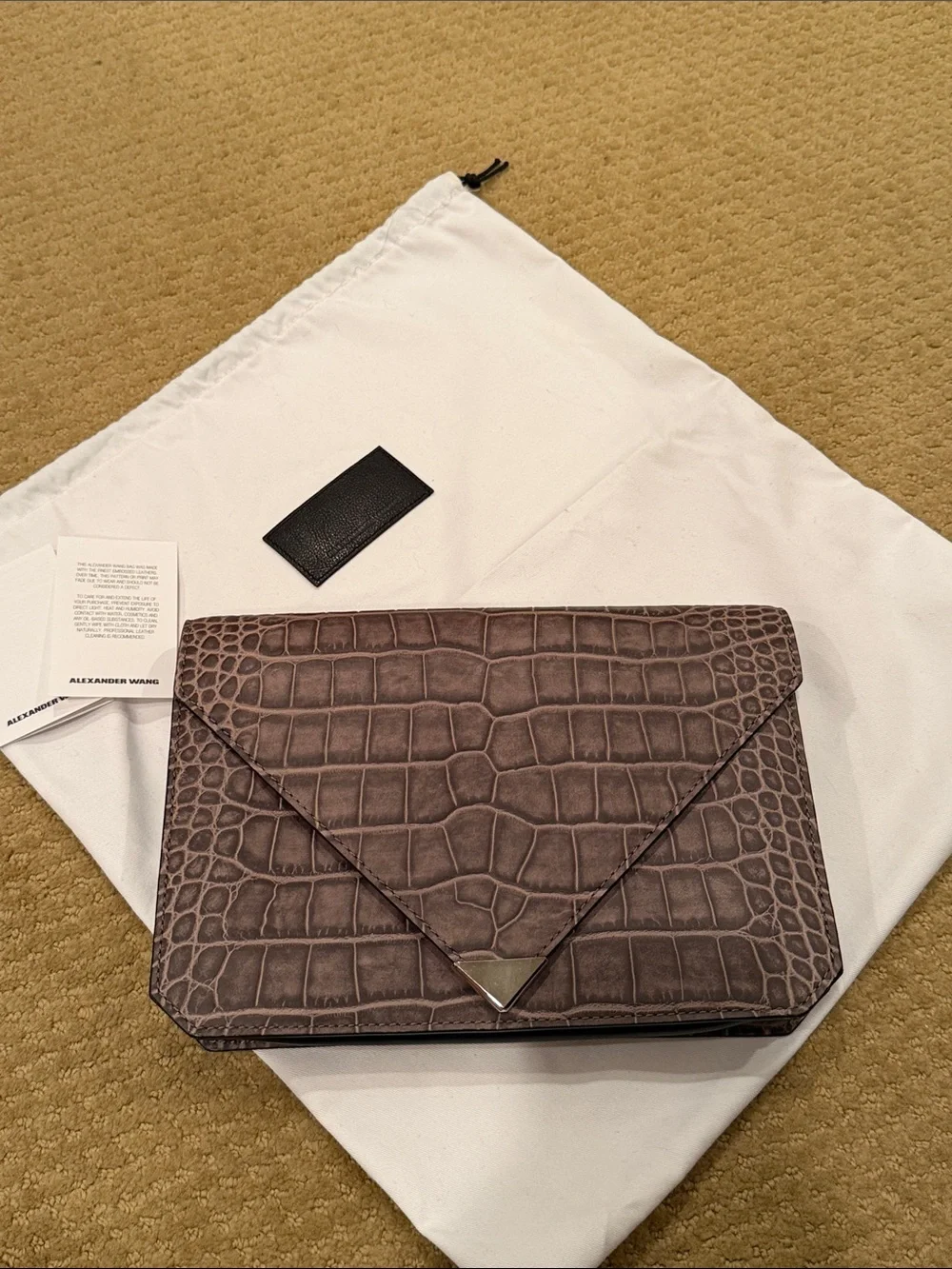 Alexander Wang women’s -Embossed Leather Envelope clutch in Taupe Gray