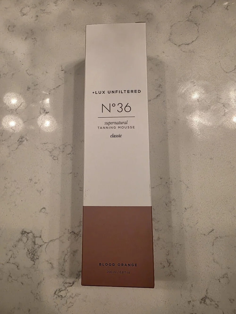 Lux Unfiltered N°36 On Holiday Hydrating Self Tanning Mousse in Blood Orange