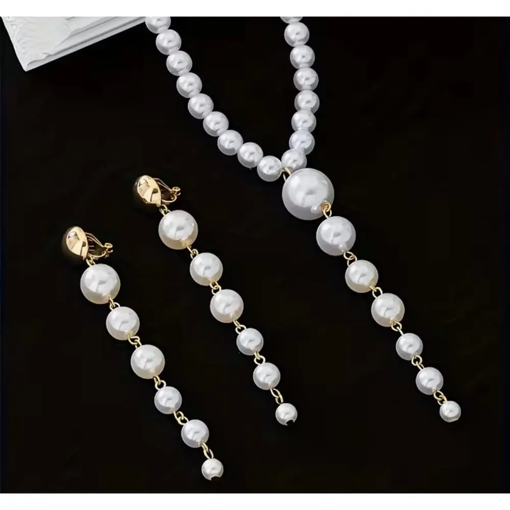 Clip on gold and white pearl necklace and earring set