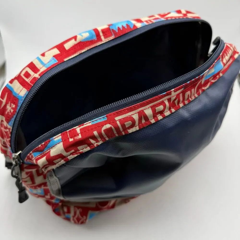 Gregory Water Resistant Flap Front Messenger Shoulder Bag Red Blue Cityscape