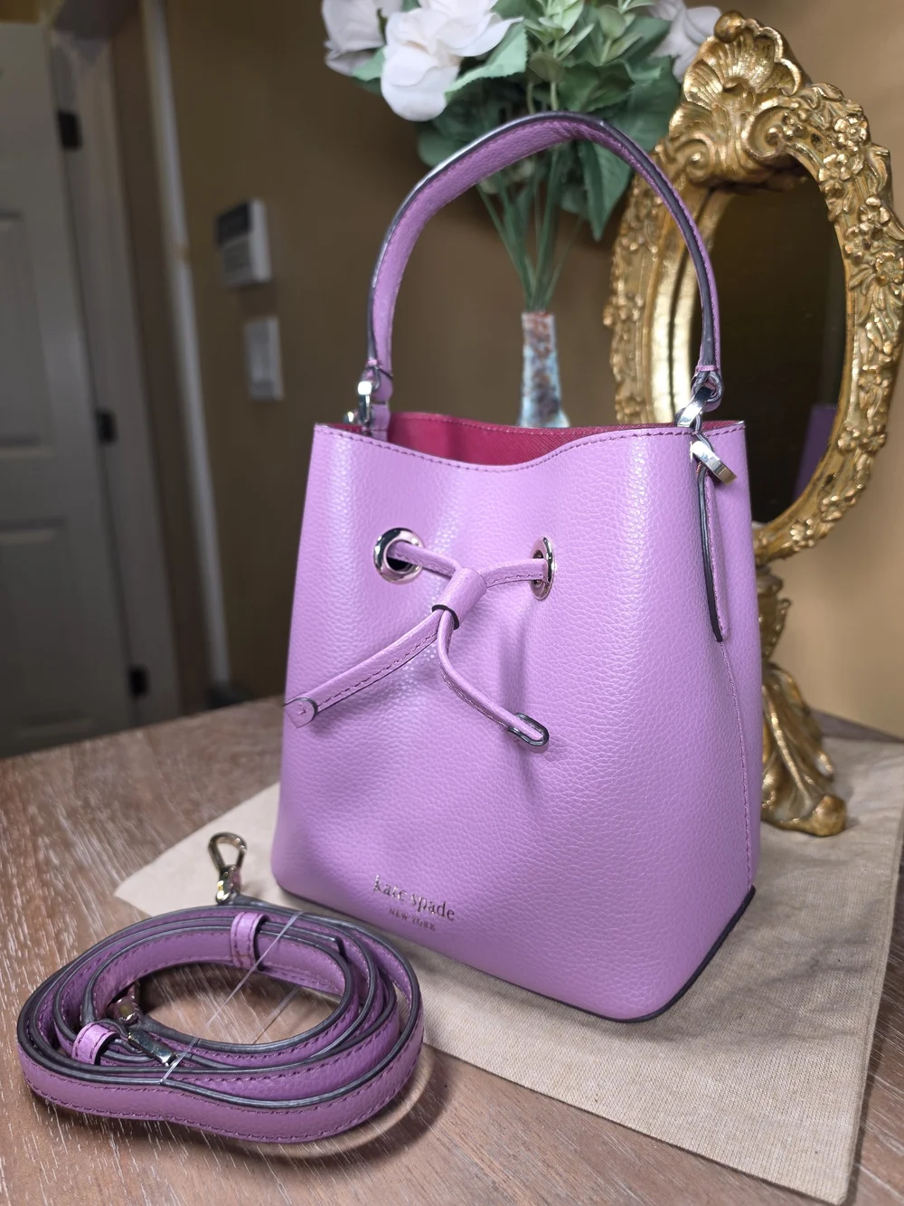 kate spade New York Eva Lavender Mauve Pebbled Leather Bucket Crossbody ($329)