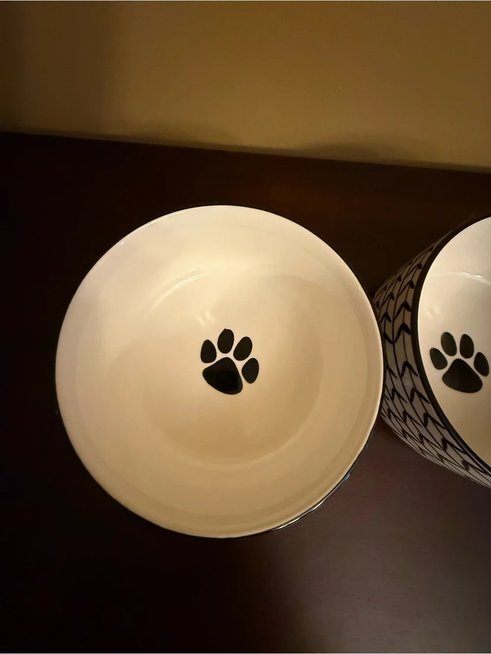 Black & White Paw-Print Stoneware Ceramic Dog Bowl Set cleaned and sanitized.
