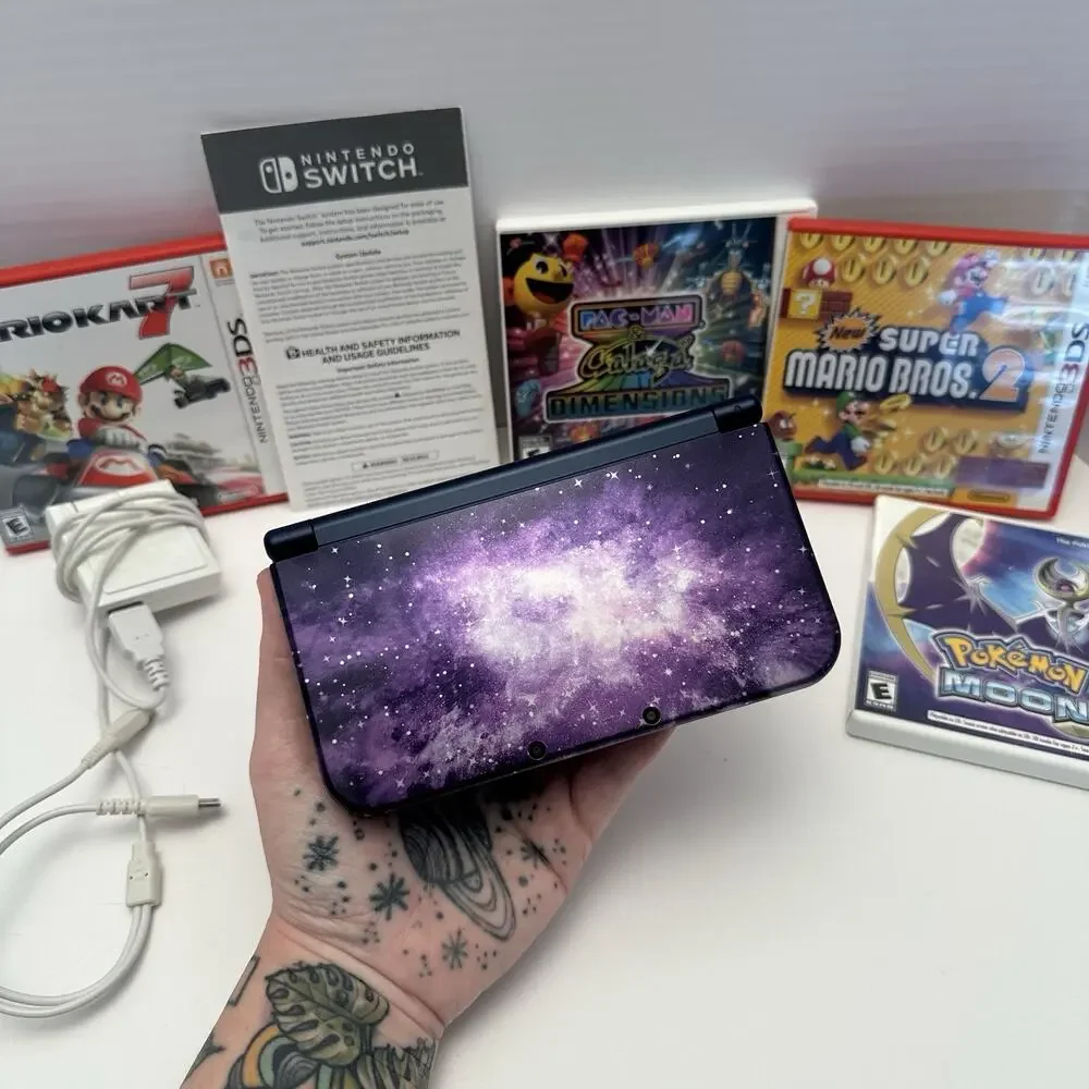 Nintendo New 3DS XL Purple Galaxy Edition - Charger, Stylus, Manual & 4 Games