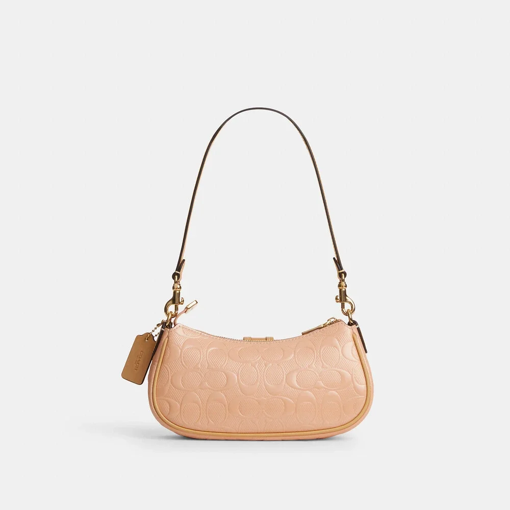 Coach pearlized signature