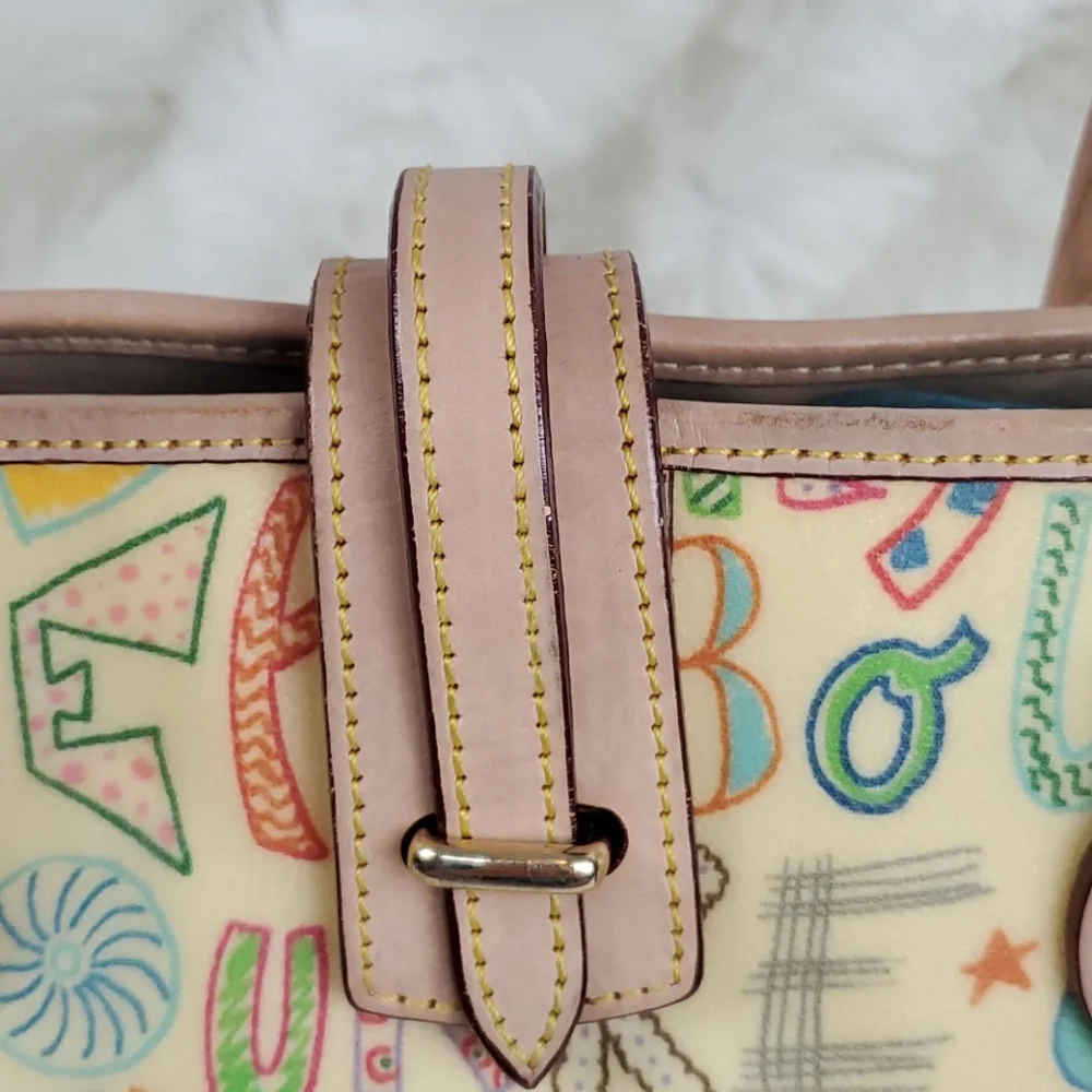 Dooney Bourke cream shoulder leather purse bag