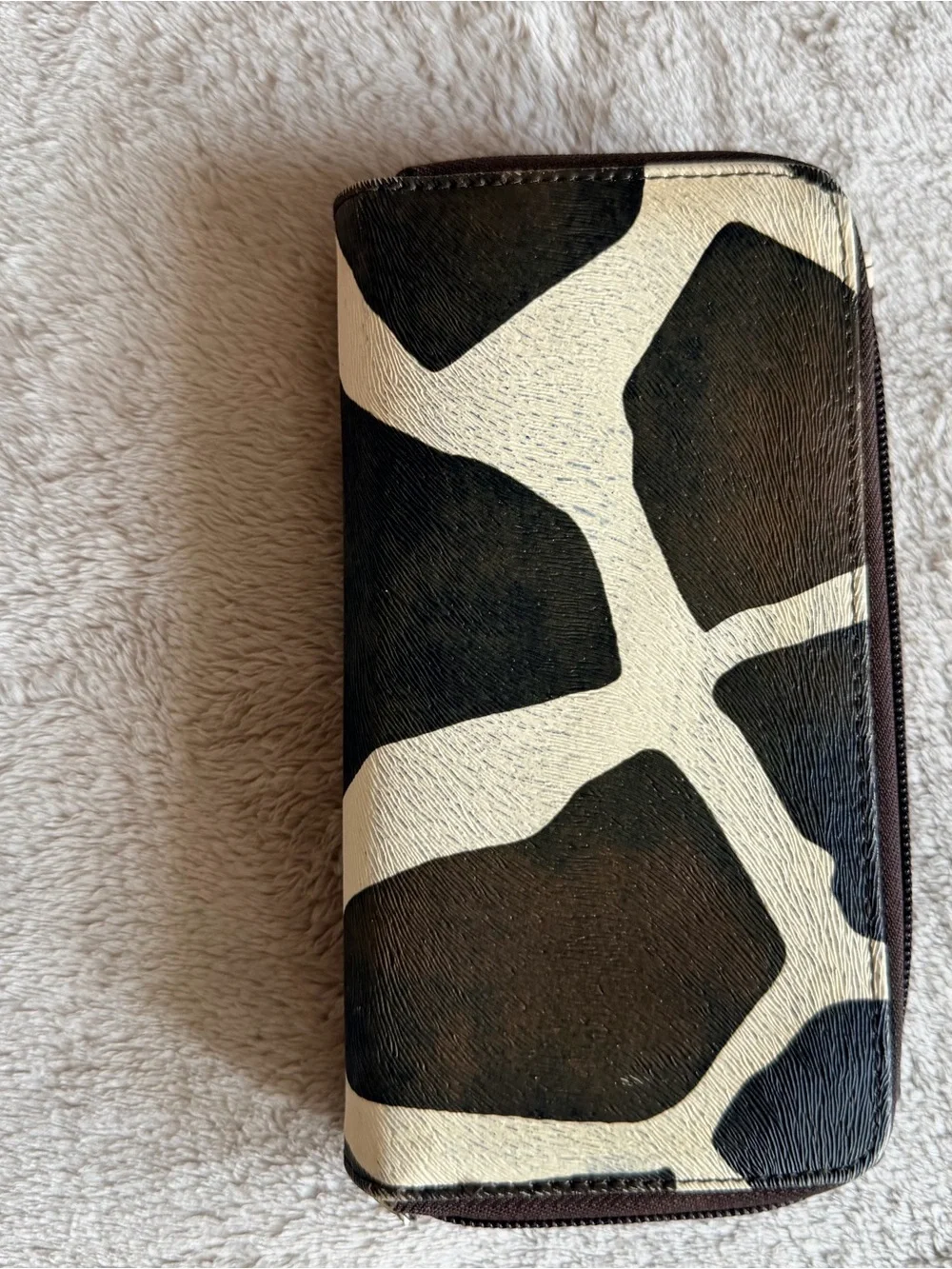 Dooney & Bourke trifold does more