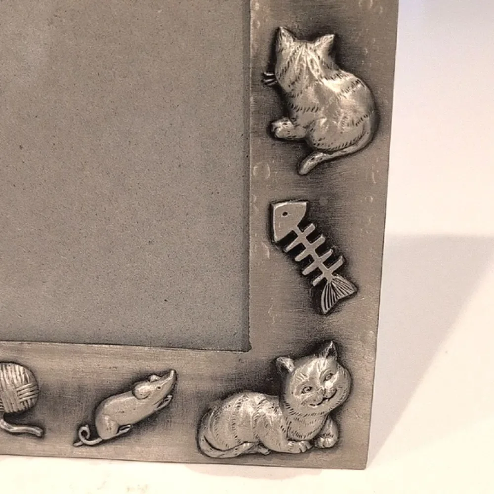 Source Unknown charming pewter