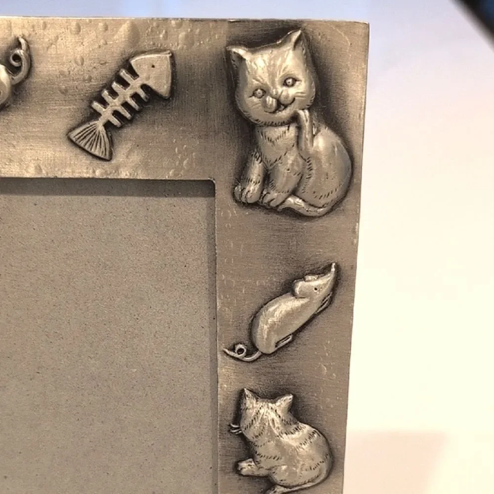 Source Unknown charming pewter