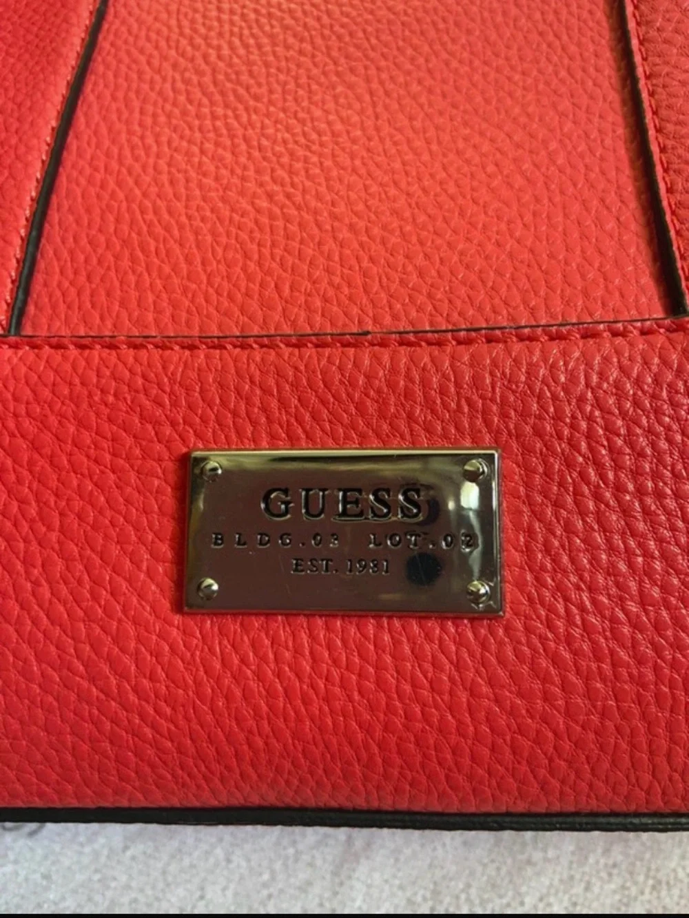 Guess bright red