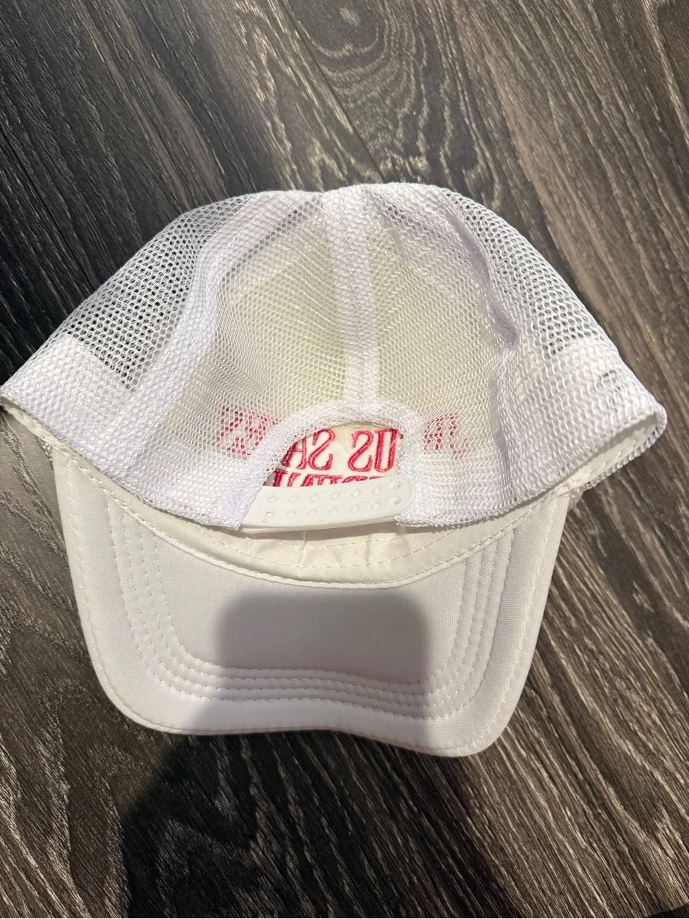 White Trucker Hat with Red Embroidery - 'Jesus Saves I Spend'
