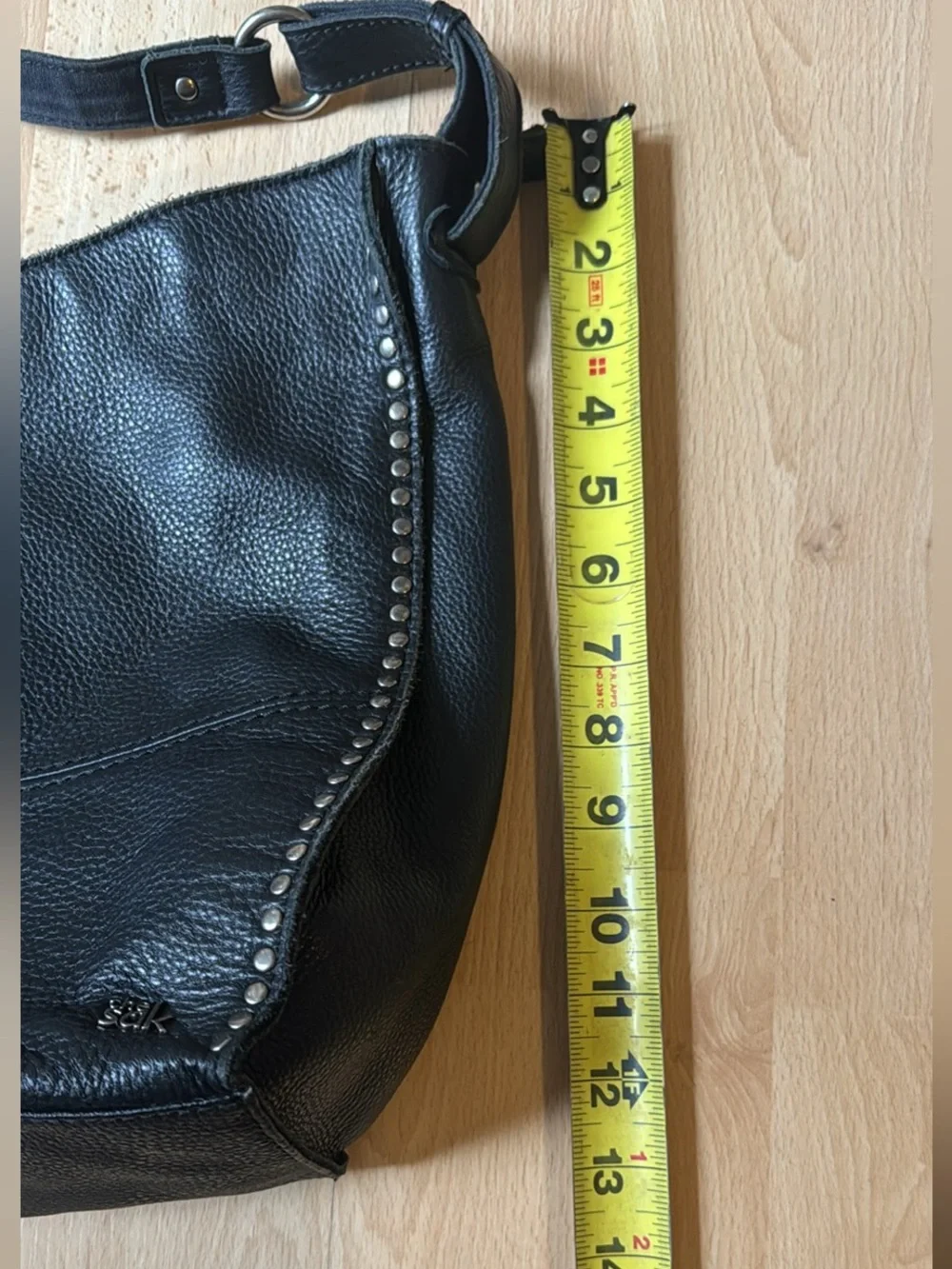 The Sak leather studded purse