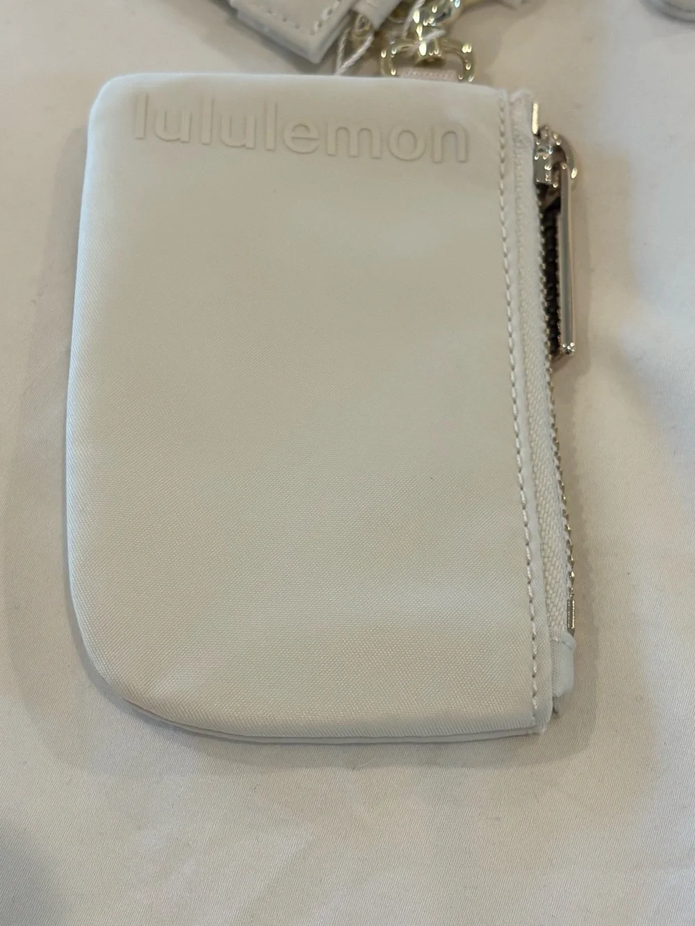 NWT Lululemon Dual Pouch Wristlet Metallic Wordmark Light Ivory Gold Cream