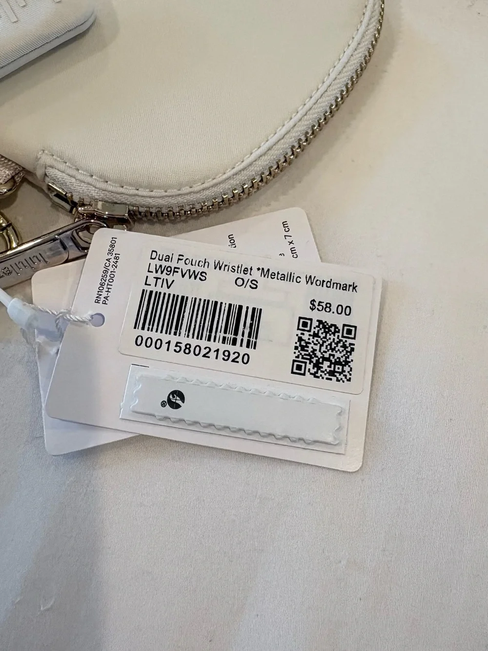 NWT Lululemon Dual Pouch Wristlet Metallic Wordmark Light Ivory Gold Cream