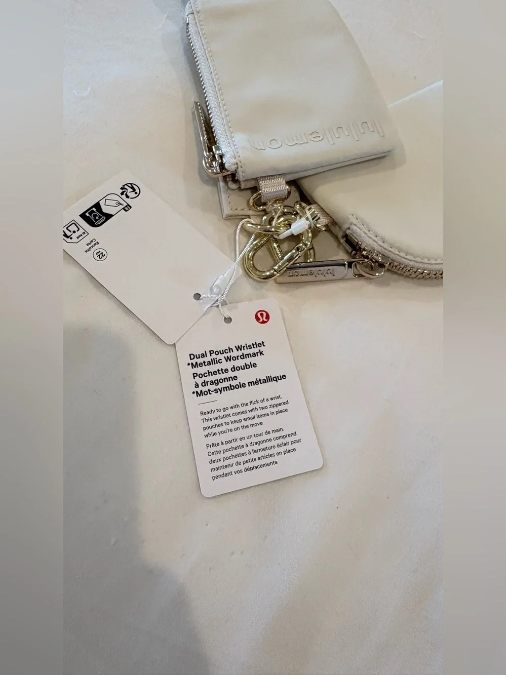 NWT Lululemon Dual Pouch Wristlet Metallic Wordmark Light Ivory Gold Cream