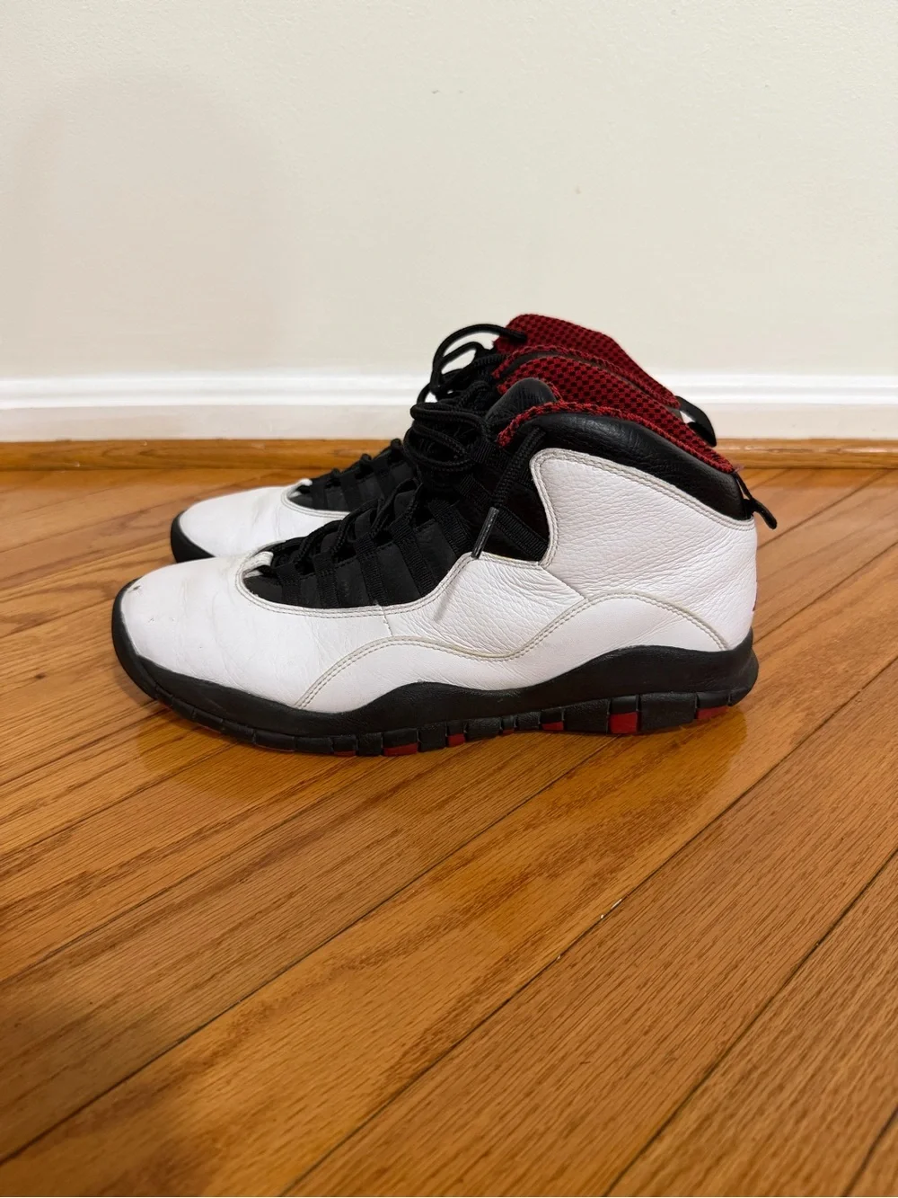 Jordan Retro ‘Bull’ 10 High-Top Sneakers in White, Black & Red