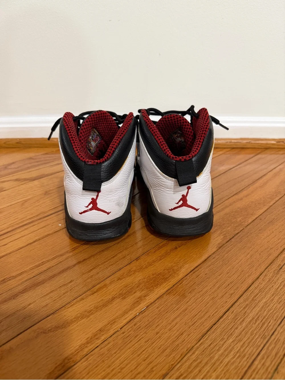 Jordan Retro ‘Bull’ 10 High-Top Sneakers in White, Black & Red
