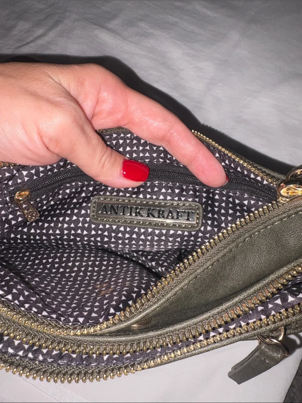 Antik Kraft compact crossbody
