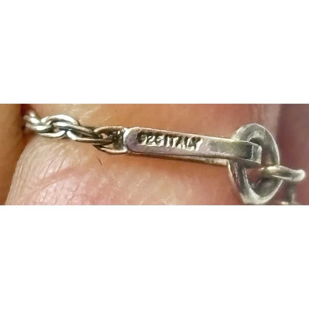 Sterling pendent sided